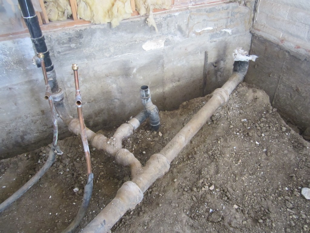 Basement_Floor_Pipes_Exposed_photo_credit_Twin_Springs_Research_Institute