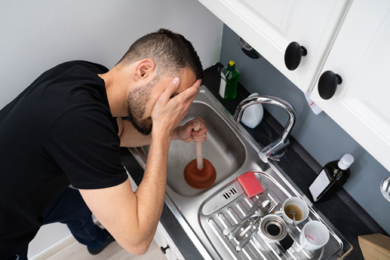 kitchen sink drain clogged garbage disposal